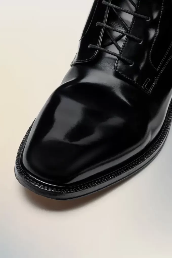 Loved to death lace-up boots